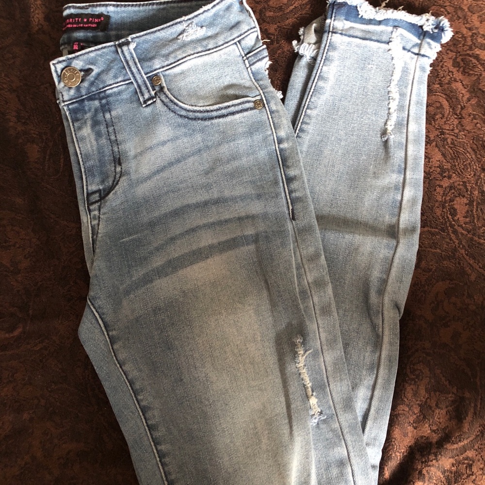 Distressed skinny jean light wash